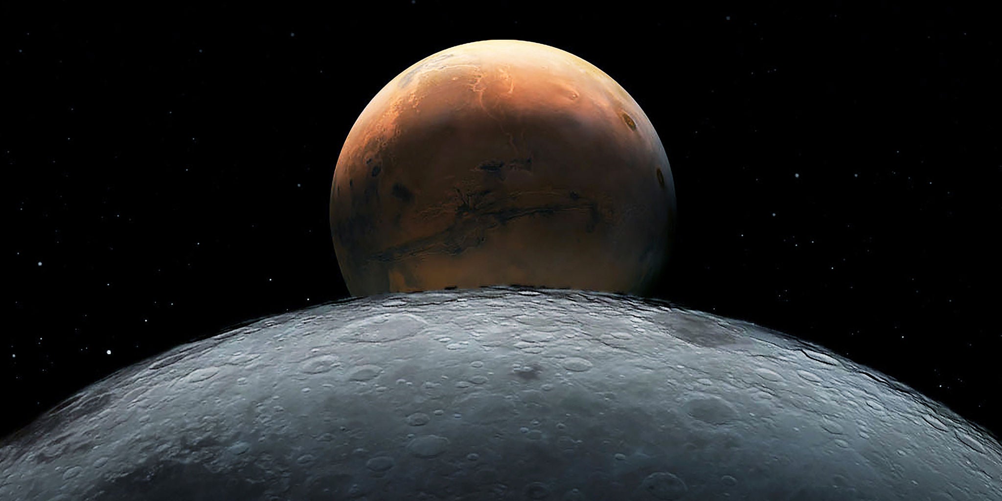 A dramatic view of Mars appears above the cratered surface of a moon or planet, set against the blackness of space. The foreground shows detailed lunar-like terrain with visible craters, while Mars is depicted with its characteristic reddish hue and surface markings. No visible text, numbers, or logos are present in the image.